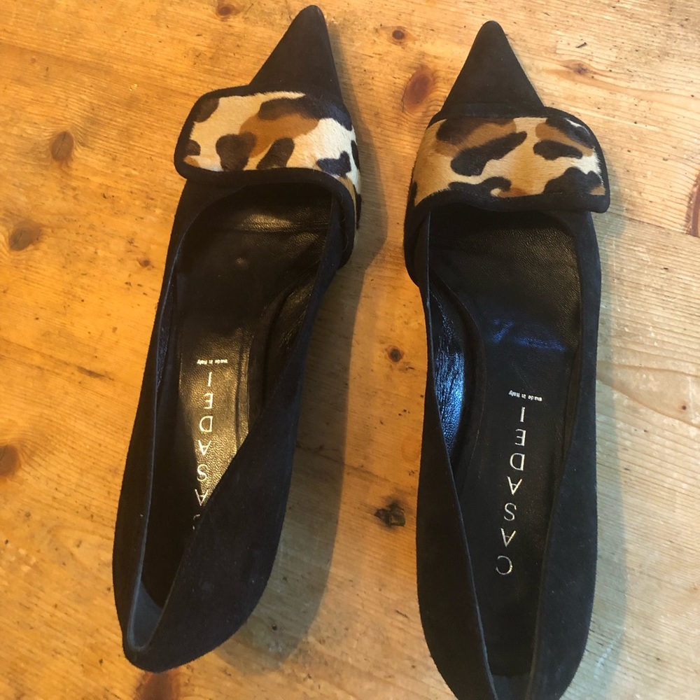 Black suede with a band of animal print material like fur.
